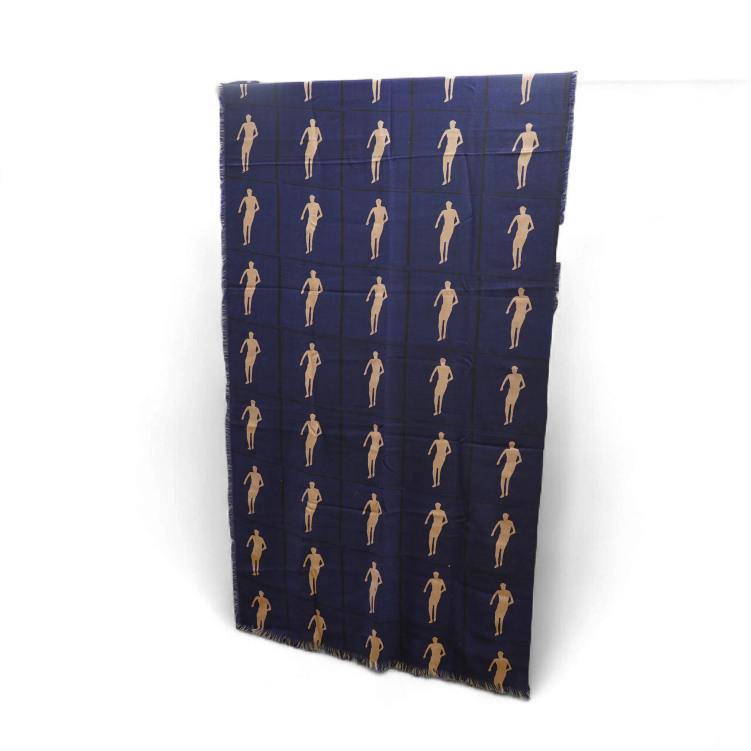 A 1983 blue wool hand printed beige cut out figures fringed - designed by Fraser Taylor of ‘The Cloth’ (RCA 1983)., 97cm x 294cm long. Condition - good